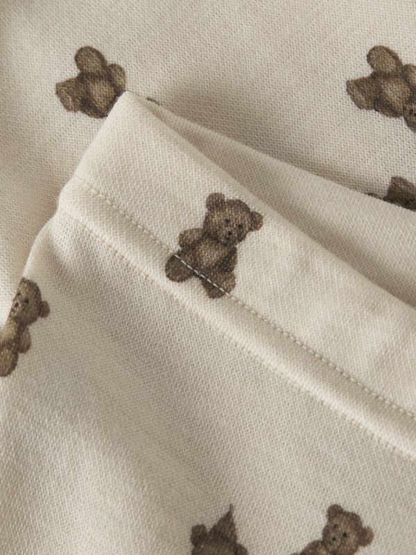 Nbnnilo beige ullstilongs m/bjørner